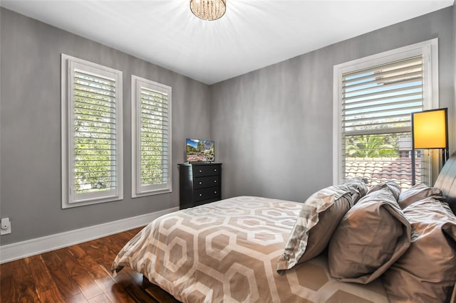 bedroom featuring dark hardwood / wood-style floors