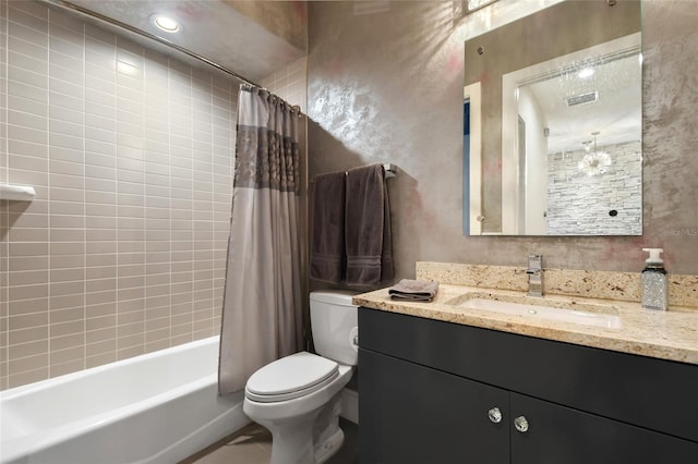 full bathroom featuring vanity, shower / bathtub combination with curtain, and toilet