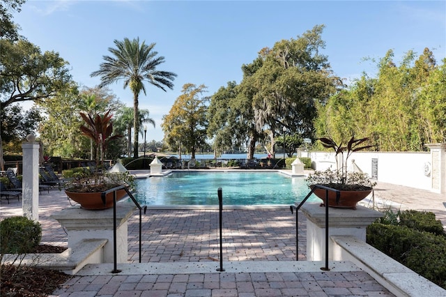 view of pool featuring a patio area