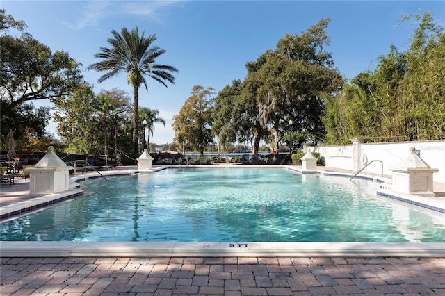 view of pool featuring a patio