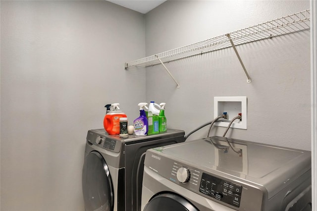 laundry area featuring washing machine and dryer