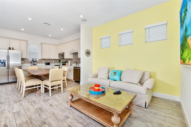 living room featuring light hardwood / wood-style floors