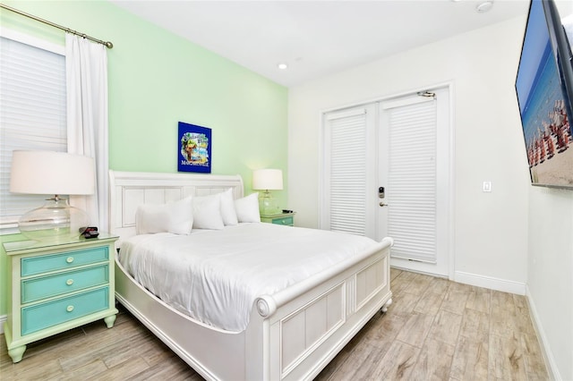 bedroom with light hardwood / wood-style flooring