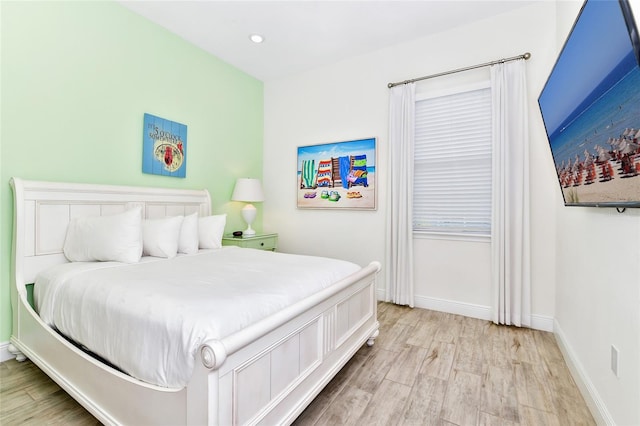 bedroom featuring light wood-type flooring