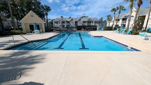 view of pool featuring a patio area