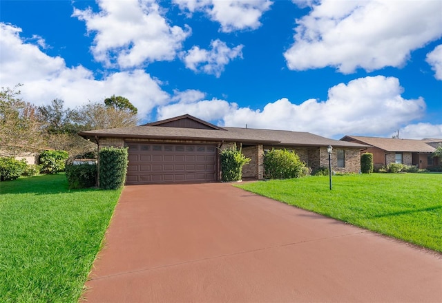 ranch-style house with a front yard and a garage