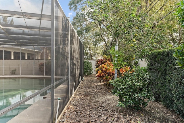 view of home's exterior with a lanai