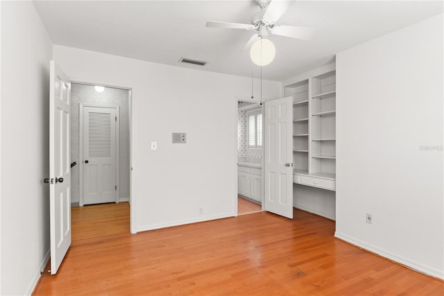 unfurnished bedroom with light hardwood / wood-style flooring and ceiling fan