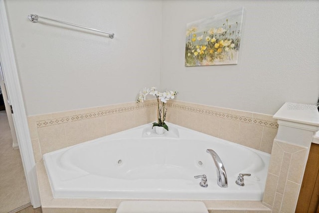 bathroom featuring a relaxing tiled tub