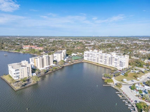 drone / aerial view with a water view