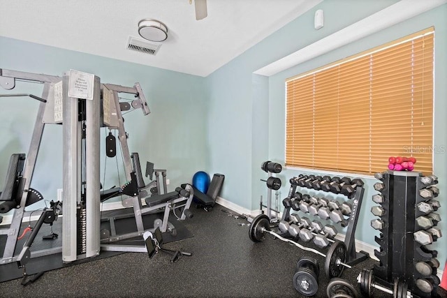 134 Starboard Ln Unit 705, Merritt Island, FL 32953 - workout room with baseboards