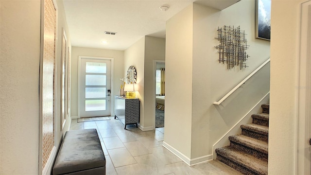 view of tiled foyer entrance