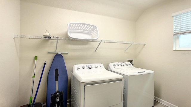 laundry area with separate washer and dryer