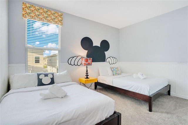 2736 Bookmark Dr, Kissimmee, FL 34746 - carpeted bedroom featuring a wainscoted wall