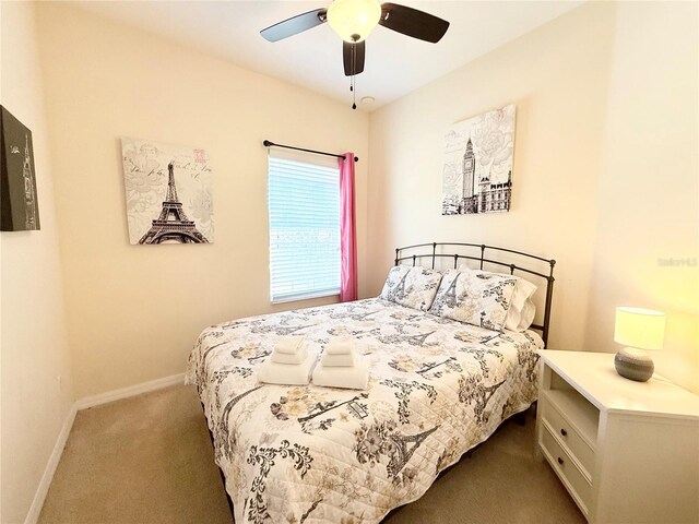 2856 Oakwater Dr Unit 2856, Kissimmee, FL 34747 - bedroom featuring carpet flooring, baseboards, and a ceiling fan