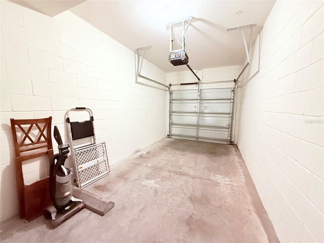 2856 Oakwater Dr Unit 2856, Kissimmee, FL 34747 - garage featuring a garage door opener