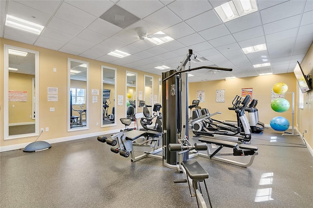 exercise room with a drop ceiling