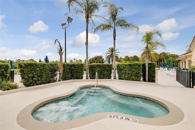 view of pool featuring a patio area