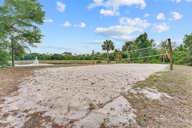 2856 Oakwater Dr Unit 2856, Kissimmee, FL 34747 - view of community featuring volleyball court and a water view