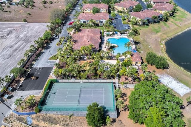 2856 Oakwater Dr Unit 2856, Kissimmee, FL 34747 - aerial view of property and surrounding area featuring a pool and a nearby body of water