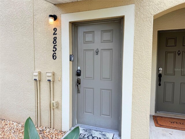 2856 Oakwater Dr Unit 2856, Kissimmee, FL 34747 - entrance to property featuring stucco siding