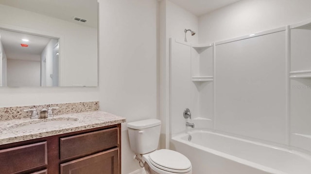 full bathroom with vanity,  shower combination, and toilet