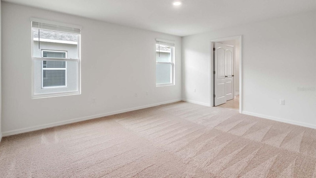 view of carpeted spare room