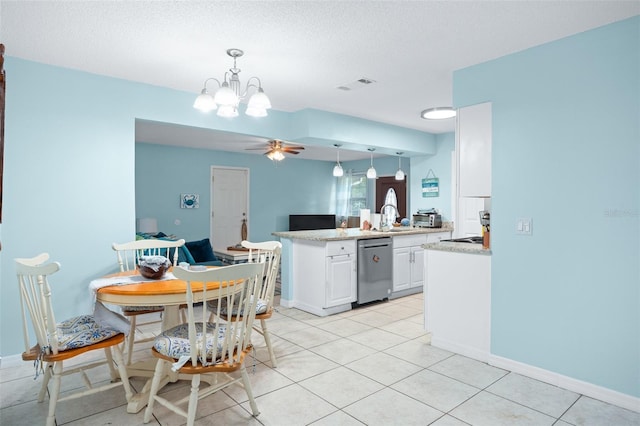 kitchen with white cabinetry, dishwasher, hanging light fixtures, kitchen peninsula, and ceiling fan with notable chandelier