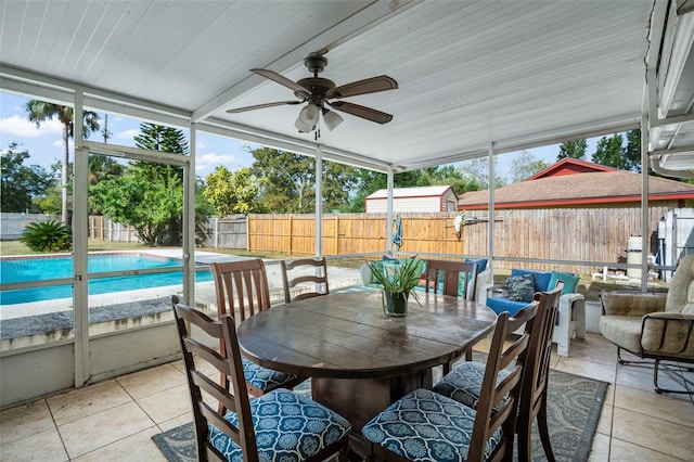 sunroom / solarium with ceiling fan