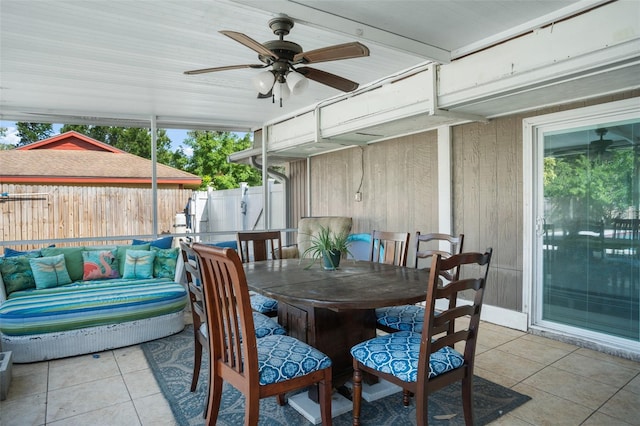 sunroom with plenty of natural light and ceiling fan