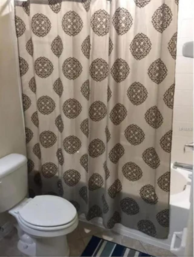 bathroom with separate shower and tub and toilet