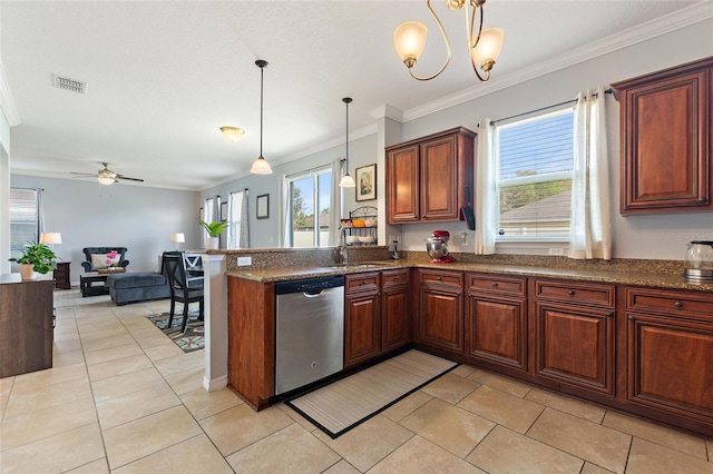 kitchen featuring dishwasher, plenty of natural light, kitchen peninsula, and hanging light fixtures