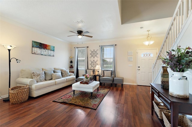 living room featuring crown molding, dark hardwood / wood-style flooring, and ceiling fan