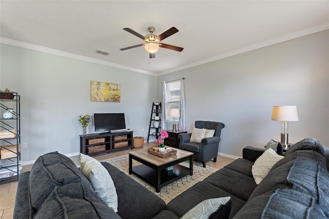 living room with ceiling fan and crown molding