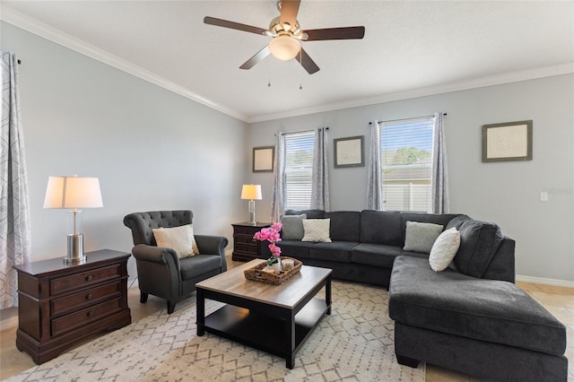 living room with ceiling fan and ornamental molding