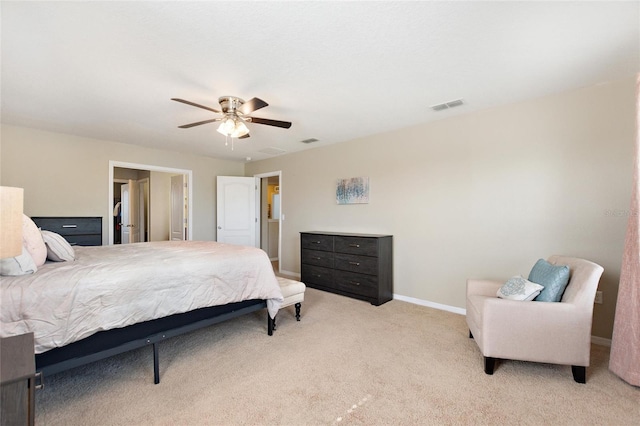 bedroom with ceiling fan and light colored carpet