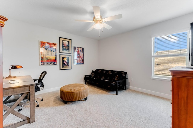 carpeted office with ceiling fan