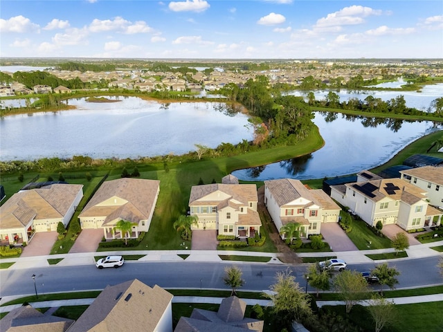 bird's eye view with a water view