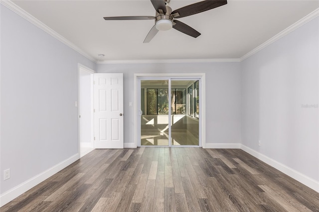 spare room with ceiling fan, dark wood-type flooring, and ornamental molding