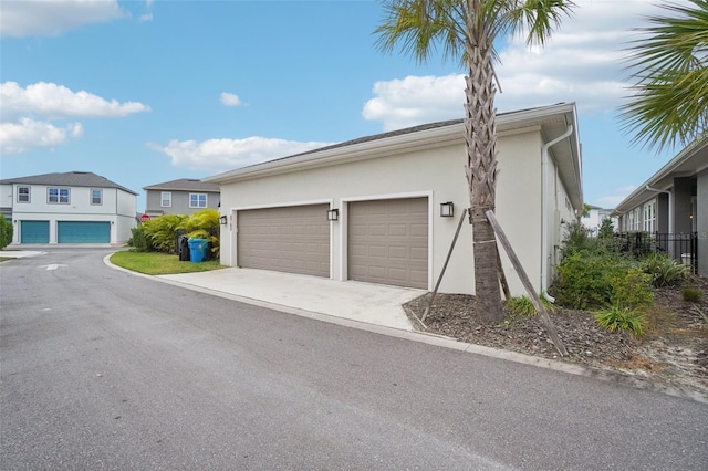 exterior space with a garage