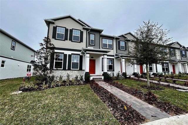 view of front of home with a front lawn