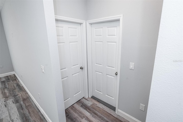 interior space with dark hardwood / wood-style flooring