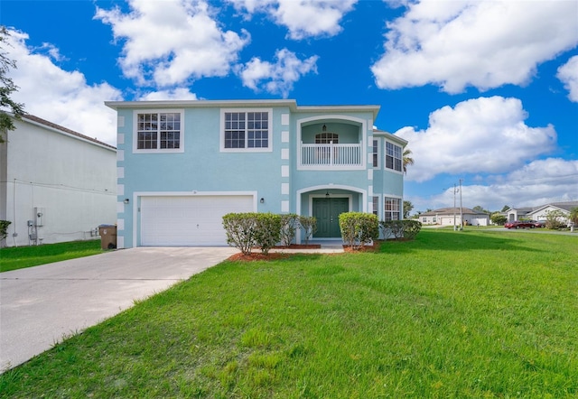 view of front of home featuring a balcony, a garage, and a front lawn