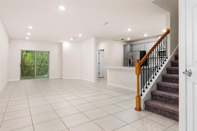 interior space with tile patterned floors and sink