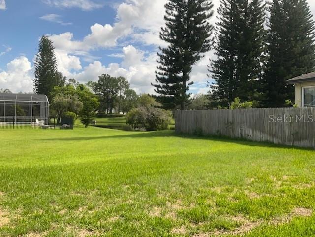 view of yard featuring fence