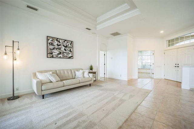 living room featuring crown molding, a towering ceiling, and light tile patterned floors