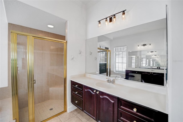 bathroom with tile patterned flooring, vanity, and an enclosed shower