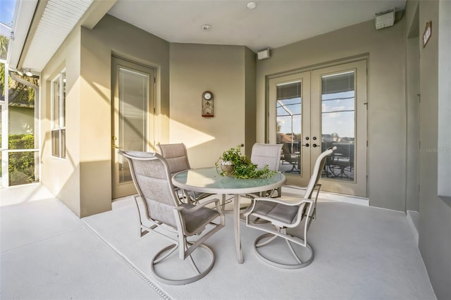 view of patio featuring french doors