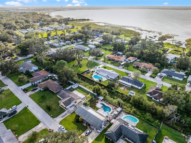 drone / aerial view with a water view