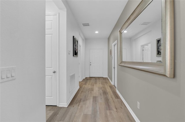 hallway featuring light hardwood / wood-style floors